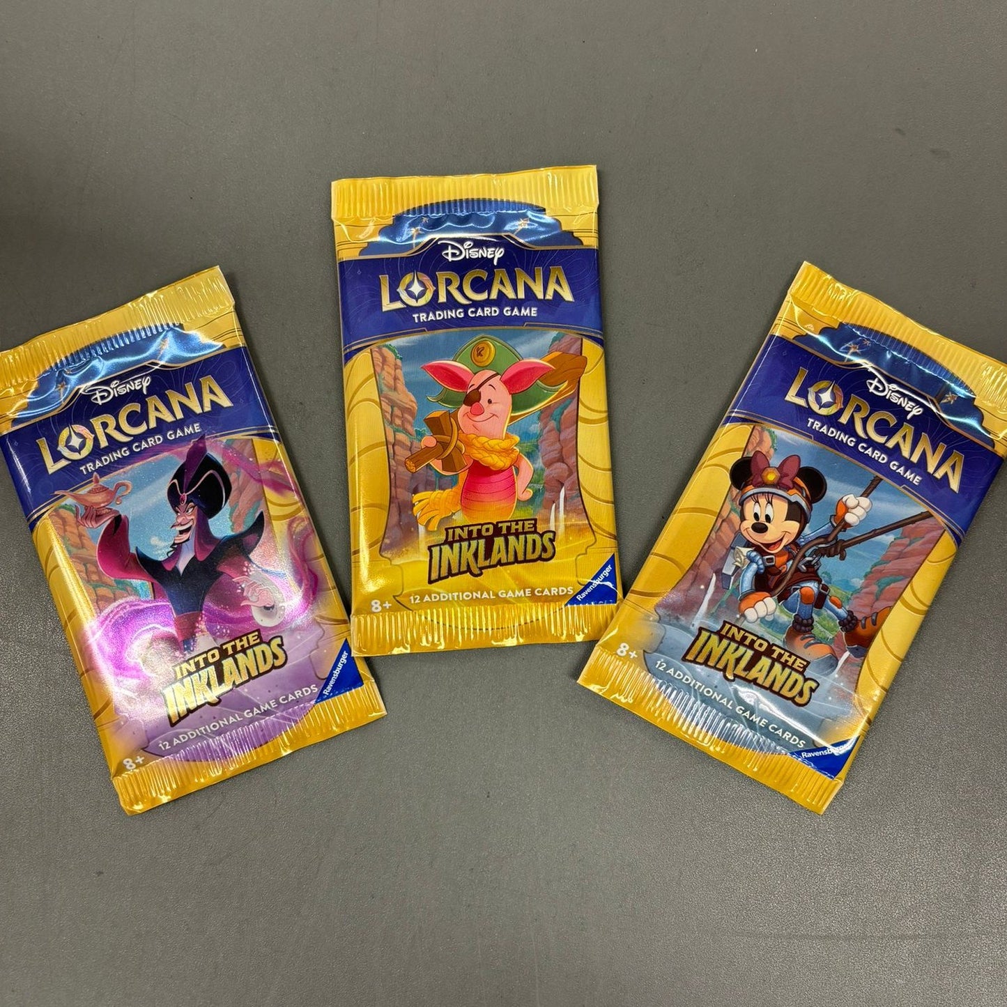 Ravensburger Disney Lorcana: 3 Booster Packs "Into the Inklands" Englisch